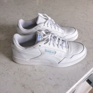 White Reebok sneakers